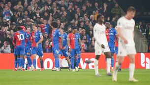 <p>Crystal Palace's Tyrick Mitchell (hidden) celebrates with team-mates after scoring their side's third goal. Picture: Zac Goodwin/PA Wire.</p>
