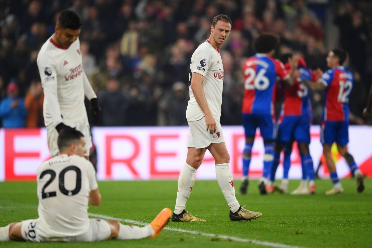 Jonny Evans of Manchester United looks dejected as he looks back towards Casemiro and Diogo Dalot after Tyrick Mitchell of Crystal Palace scored his team's third goal. Picture: Setterfield/Getty Images