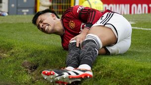 <p>LISANBLOW: Manchester United's Lisandro Martinez grimaces in pain after an injury during the English Premier League soccer match between Manchester United and West Ham United at the Old Trafford. Pic credit: AP Photo/Dave Thompson.</p>