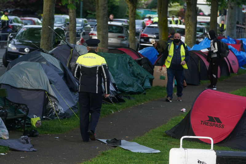 An early morning operation to remove tents which have been pitched by asylum seekers along a stretch of the Grand Canal, Dublin.