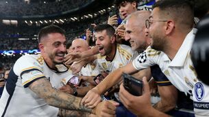 <p>
                <span class="contextmenu emphasis">MAN OF THE HOUR:</span> Real Madrid's Joselu celebrates with the fans</p>