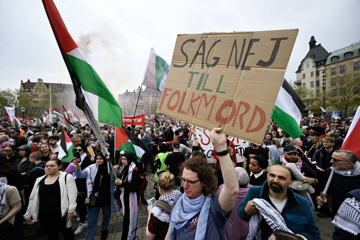 A Protester holds up a sign reading "Say no to genocide" during a rally in Malmo. Picture: Johan NILSSON/AFP via Getty Images