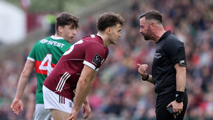 <p>Galway's Robert Finnerty is spoken to by referee David Gough during Sunday's Connacht SFC final. Pic: INPHO/Bryan Keane</p>