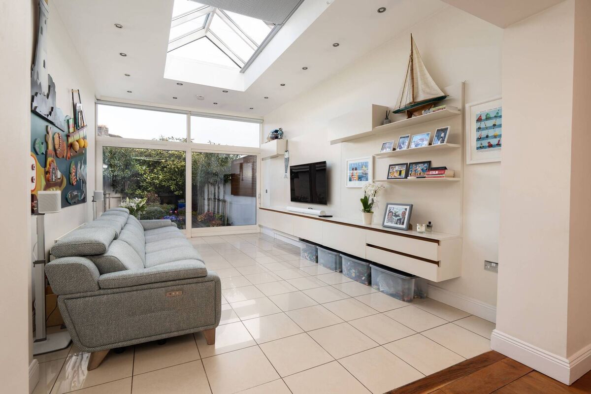 Sunny family room to the back