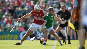 <p>CARRY THE FIGHT: Declan Dalton of Cork battles Limerick's Peter Casey. Pic: Daire Brennan, Sportsfile</p>