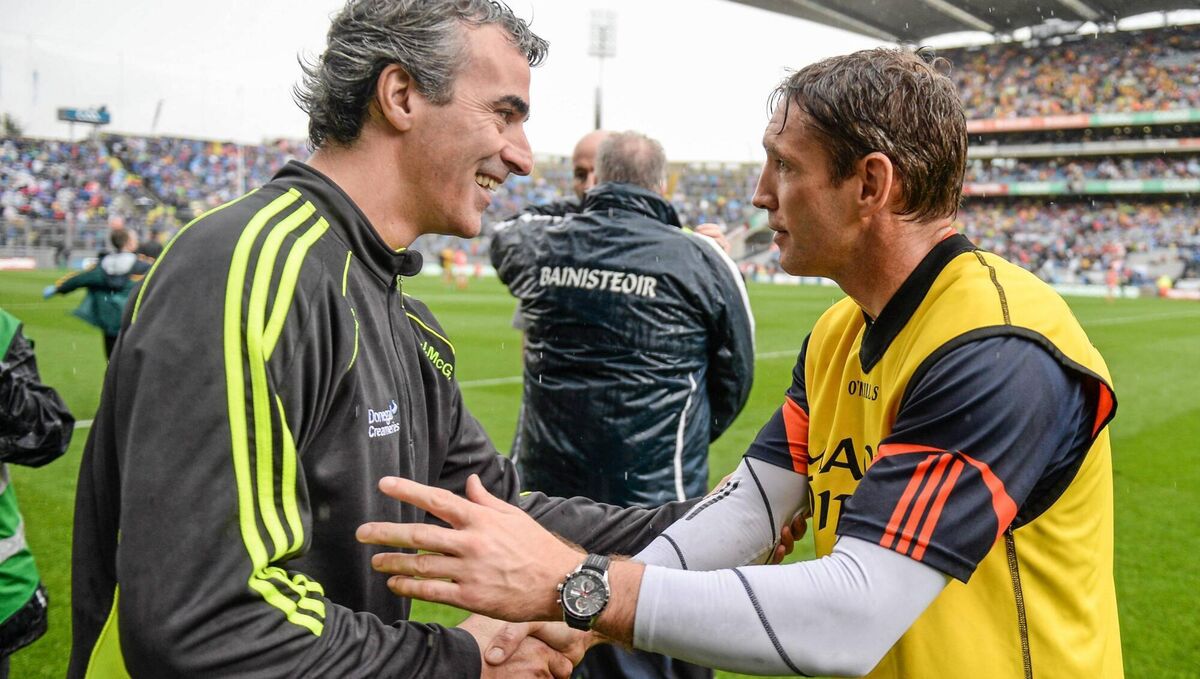 Donegal manager Jim McGuinness with Armagh selector Kieran McGeeney after the All-Ireland quarter-final in 2014. Pic: Stephen McCarthy / SPORTSFILE Donegal manager Jim McGuinness with Armagh selector Kieran McGeeney after the All-Ireland quarter-final in 2014. Pic: Stephen McCarthy / SPORTSFILE