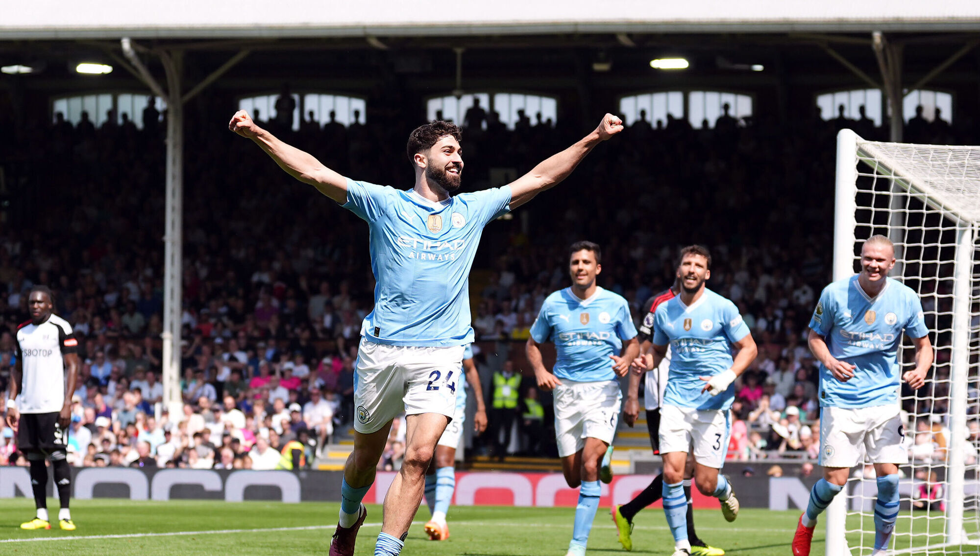 Man City take big step to Premier League title with routine win at Fulham 