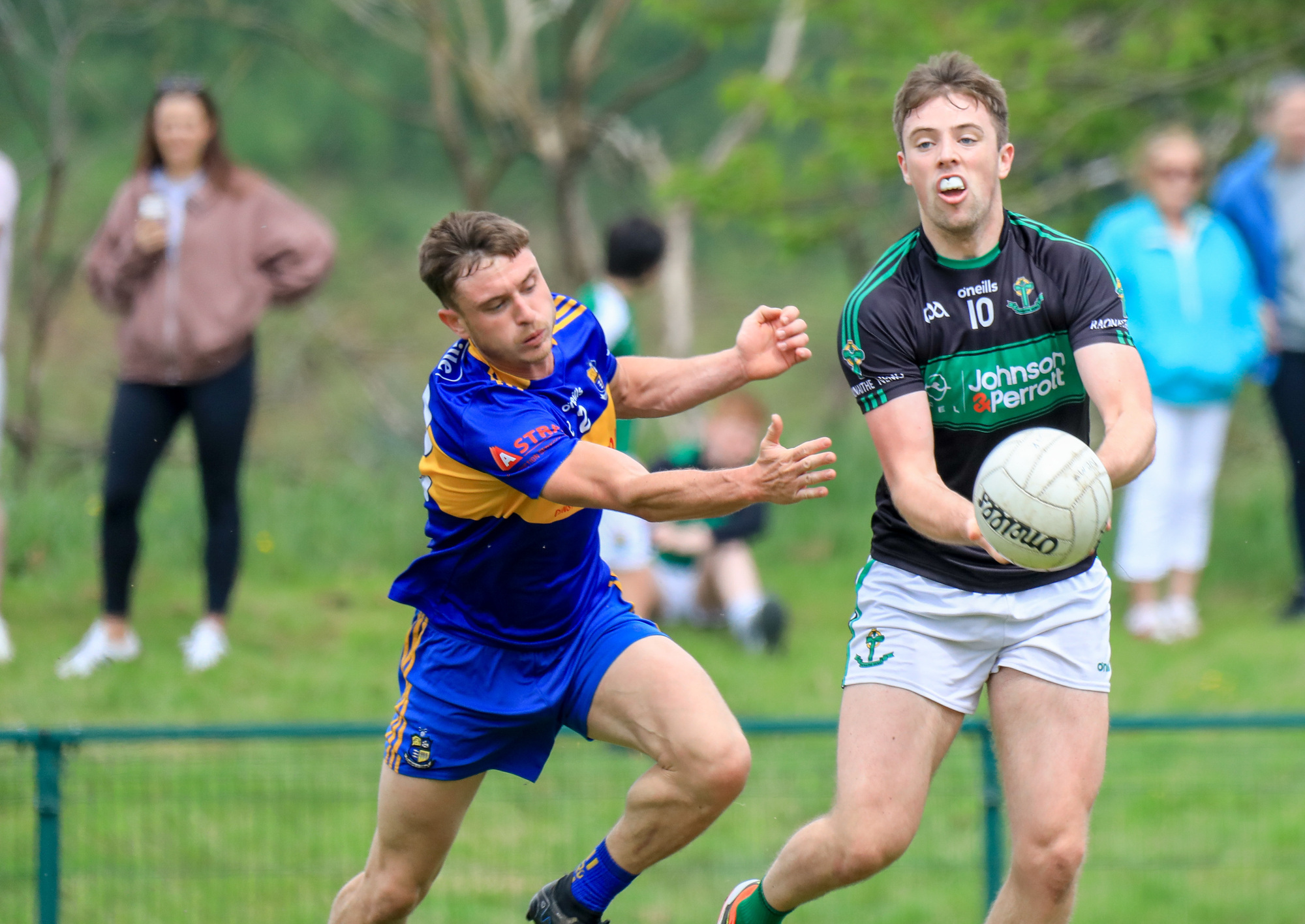 ON THE MARK: Nemo's Ross Corkery breaks free from Luke Boyle. Pic: David Creedon