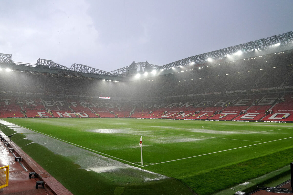 A general view of the waterlogged pitch following the Premier League match at Old Trafford. Photo credit: Martin Rickett/PA Wire.