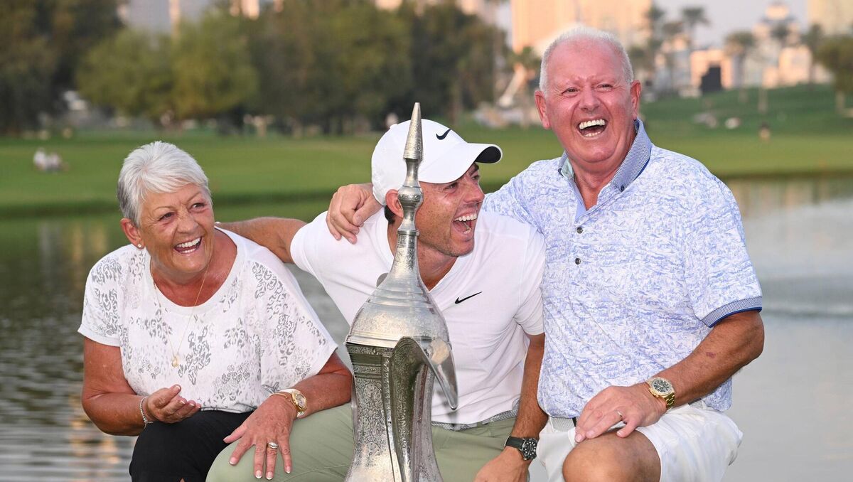 Mum's the word: Rory McIlroy with parents, Rosie and Gerry after last January's win at the Hero Dubai Desert Classic