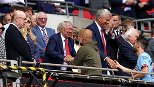 <p>Sir Alex Ferguson greets Manchester City manager Pep Guardiola (Nick Potts/PA)</p>
