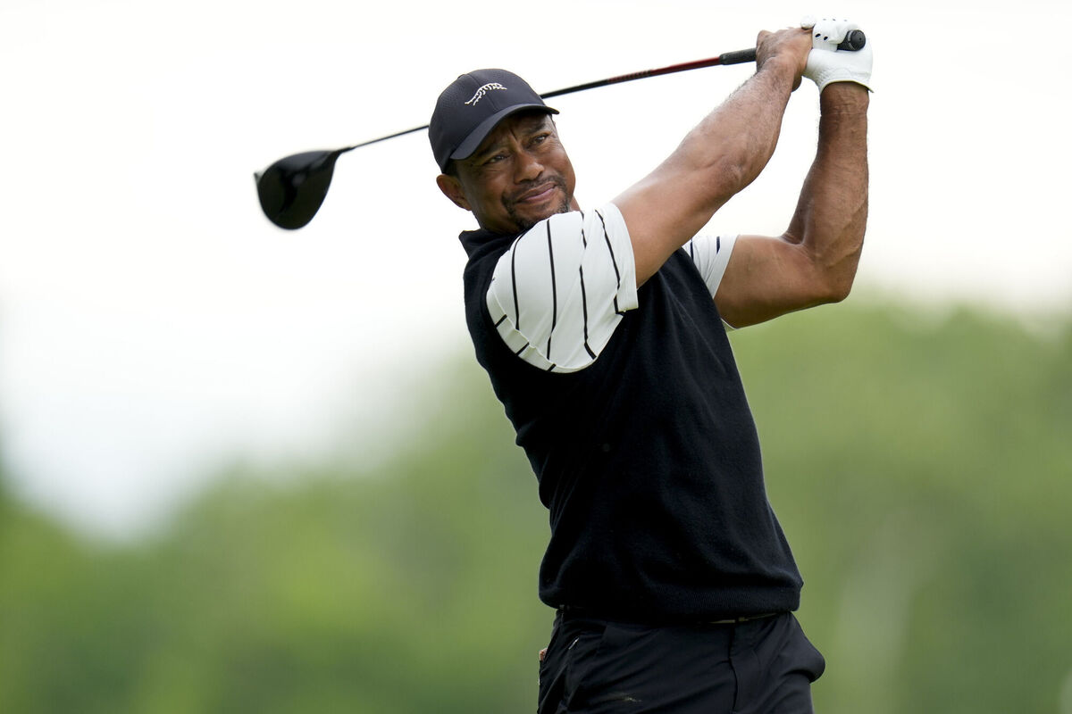 Tiger Woods hits his tee shot on the fifth hole during a practice round for the PGA Championship. Picture: AP Photo/Jeff Roberson Tiger Woods hits his tee shot on the fifth hole during a practice round for the PGA Championship. Picture: AP Photo/Jeff Roberson