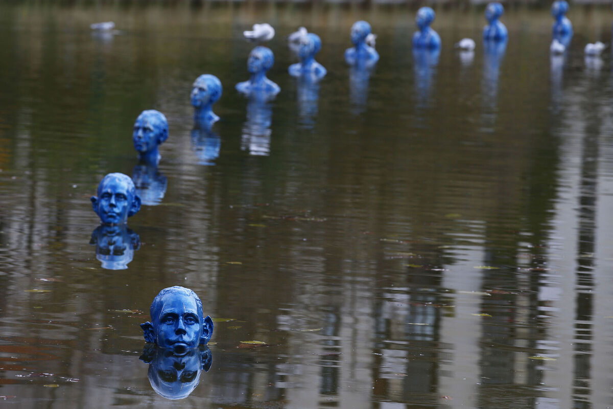 Argentinian artist Pedro Marzorati’s sculptures “Where the Tides Ebb and Flow” point to the rising waters of the global warming, capturing the need for action during COP21, United Nations Climate Change Conference, in Paris in 2015. Photo: Francois Mori / AP Photo
                    