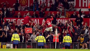 <p>Manchester United's Amad Diallo celebrates scoring his side's second goal. Picture: Martin Rickett/PA Wire.</p>