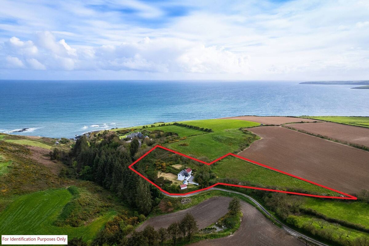 Cove Cottage comes on two coastal acres Cove Cottage comes on two coastal acres