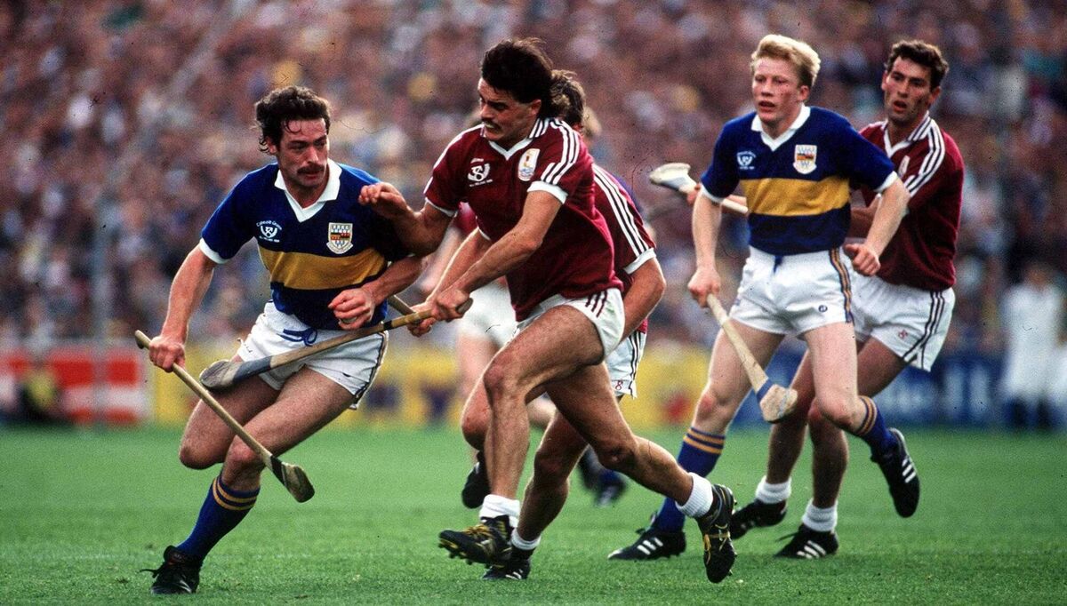 Donie O'Connell of Tipperary in action against Gerry McInerney of Galway, as Aidan Ryan of Tipperary and Michael Coleman of Galway watch on. Pic: Ray McManus/Sportsfile Donie O'Connell of Tipperary in action against Gerry McInerney of Galway, as Aidan Ryan of Tipperary and Michael Coleman of Galway watch on. Pic: Ray McManus/Sportsfile