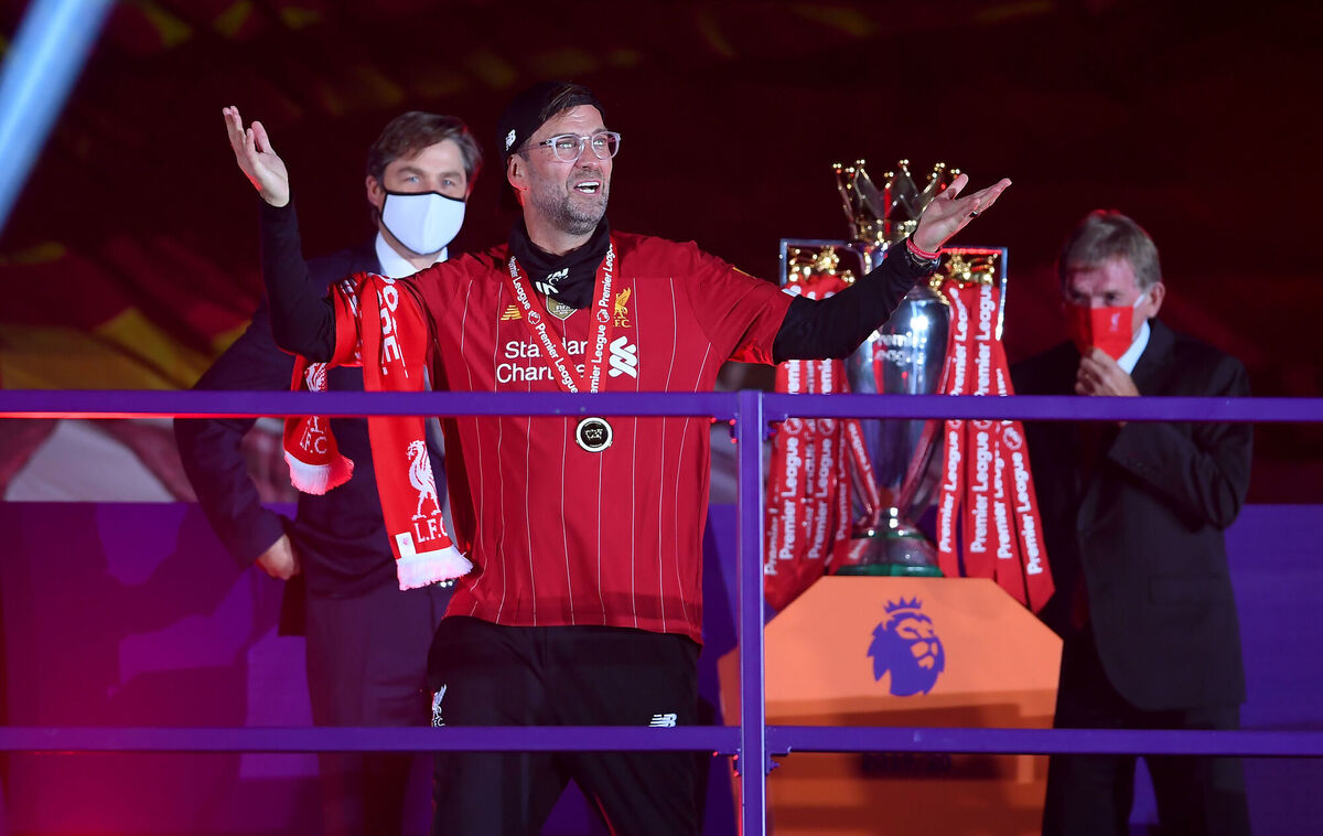 Liverpool manager Jurgen Klopp enjoys the post-match celebrations as the team receive the Premier League trophy after the Premier League match at Anfield, Liverpool.
