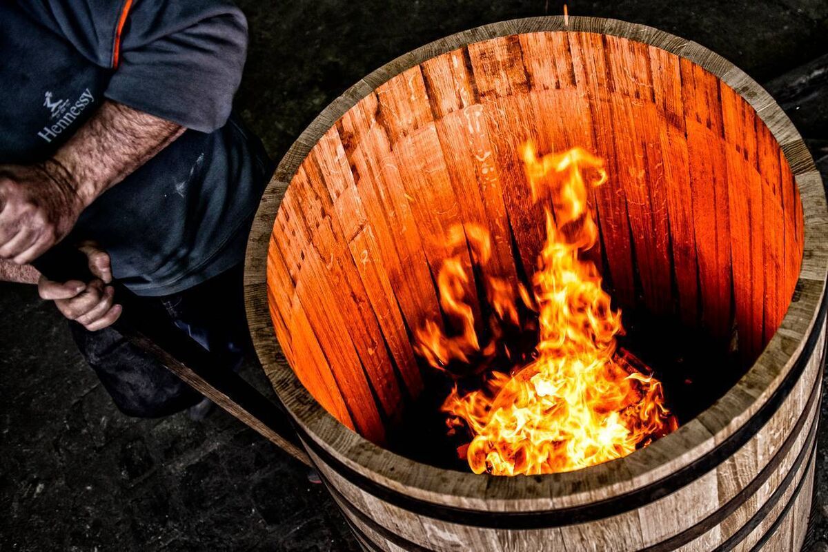 Cooper at work in the Hennessy cooperage Cooper at work in the Hennessy cooperage