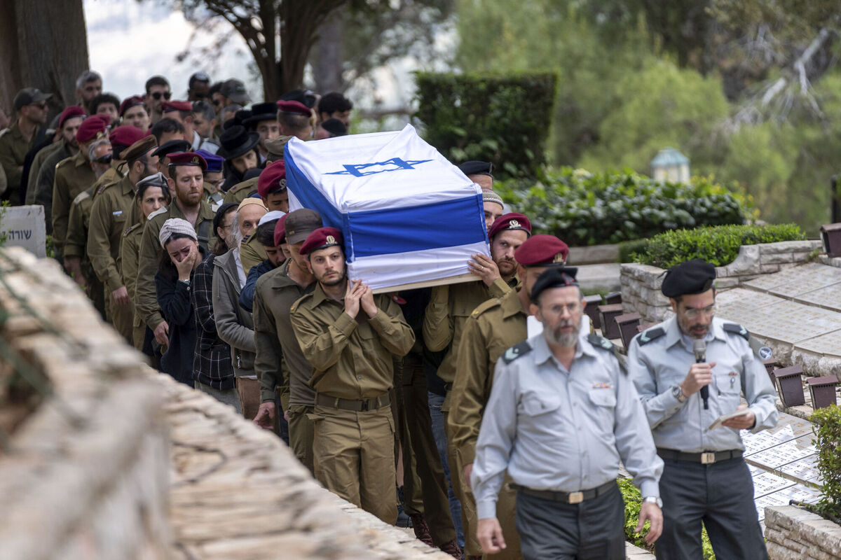 Israeli soldiers carry the flag-draped casket of Master Sgt Nahman Natan Hertz during his funeral at Mt Herzl military cemetery in Jerusalem on Tuesday, May 7. Hertz and another soldier were killed, and one injured, in northern Israel after an explosive drone attack from Lebanon. Picture: Ohad Zwigenberg/AP Israeli soldiers carry the flag-draped casket of Master Sgt Nahman Natan Hertz during his funeral at Mt Herzl military cemetery in Jerusalem on Tuesday, May 7. Hertz and another soldier were killed, and one injured, in northern Israel after an explosive drone attack from Lebanon. Picture: Ohad Zwigenberg/AP