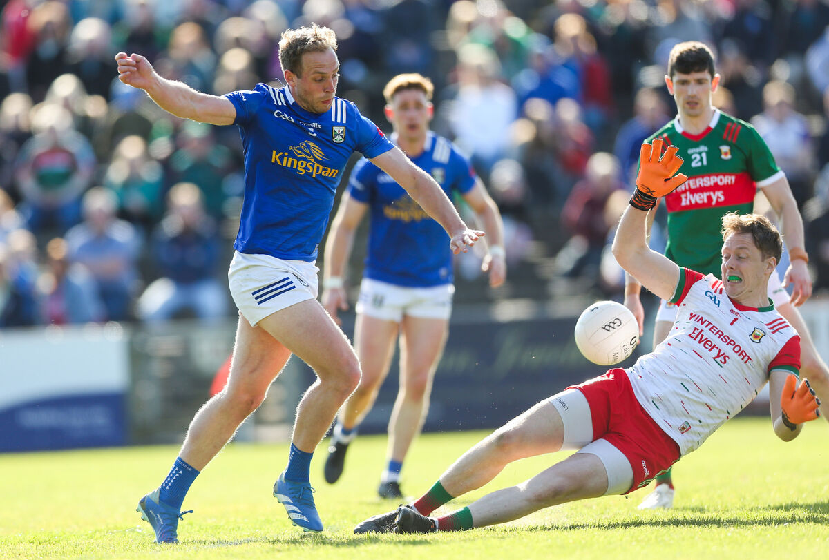 Cavan's Padraig Faulkner and Colm Reape of Mayo Pic ©INPHO/Tom Maher
