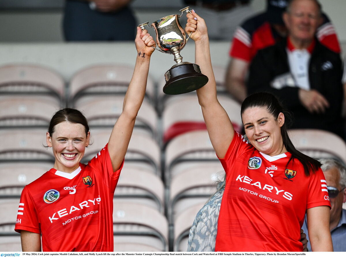 Cork joint captains Meabh Cahalane, left, and Molly Lynch lift the cup after the Munster Senior Camogie Championship final match between Cork and Waterford at FBD Semple Stadium in Thurles, Tipperary. Photo by Brendan Moran/Sportsfile