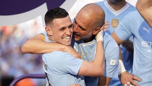 <p>Manchester City's head coach Pep Guardiola, right, celebrates with Manchester City's Phil Foden at the end of the English Premier League win over West Ham. Pic: AP Photo/Dave Thompson.</p>