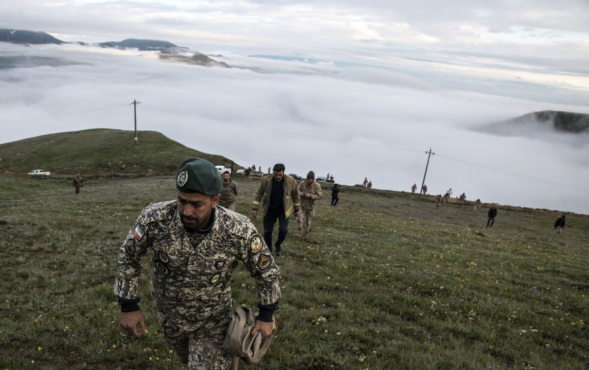 Rescue team members search for the wreckage of the helicopter carrying Iranian president Ebrahim Raisi after it crashed in Varzaghan in northwestern Iran. Picture: Azin Haghighi, Moj News Agency via AP