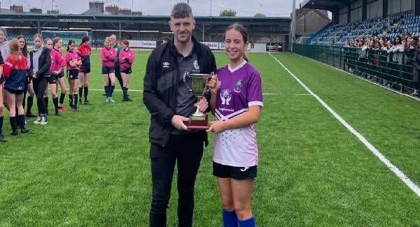 Mr. Cian O’ Flynn (Regina Mundi Coach) and Faye Hanratty (Captain) with the U-15 Girls Cork Schools Cup. The schools first ever soccer title. Mr. Cian O’ Flynn (Regina Mundi Coach) and Faye Hanratty (Captain) with the U-15 Girls Cork Schools Cup. The schools first ever soccer title.