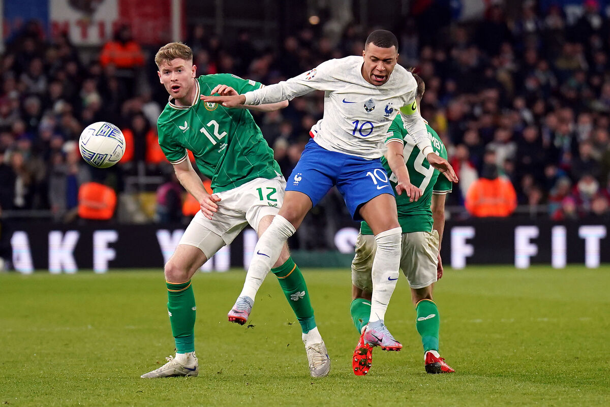 Republic of Ireland's Nathan Collins (left) and France's Kylian Mbappe battle for the ball.