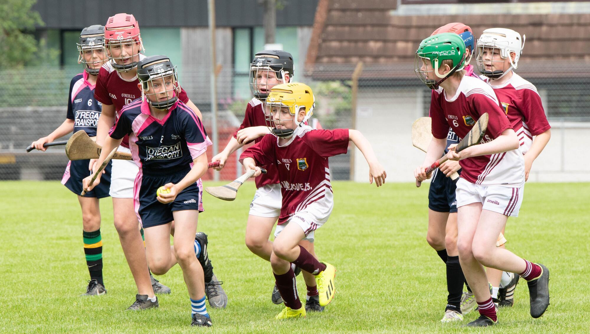 Luke O'hlarlaithe of GS Ui Drisceoil breaks away from a packed midfield during the Allianz Sciath na Scol DH3 final against Timoleague in Pairc Ui Rinn. Pictutre: Howard Crowdy