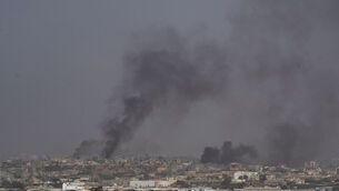 Smokes rise to the sky after explosions in the Gaza Strip, as seen from southern Israel (Leo Correa/AP)