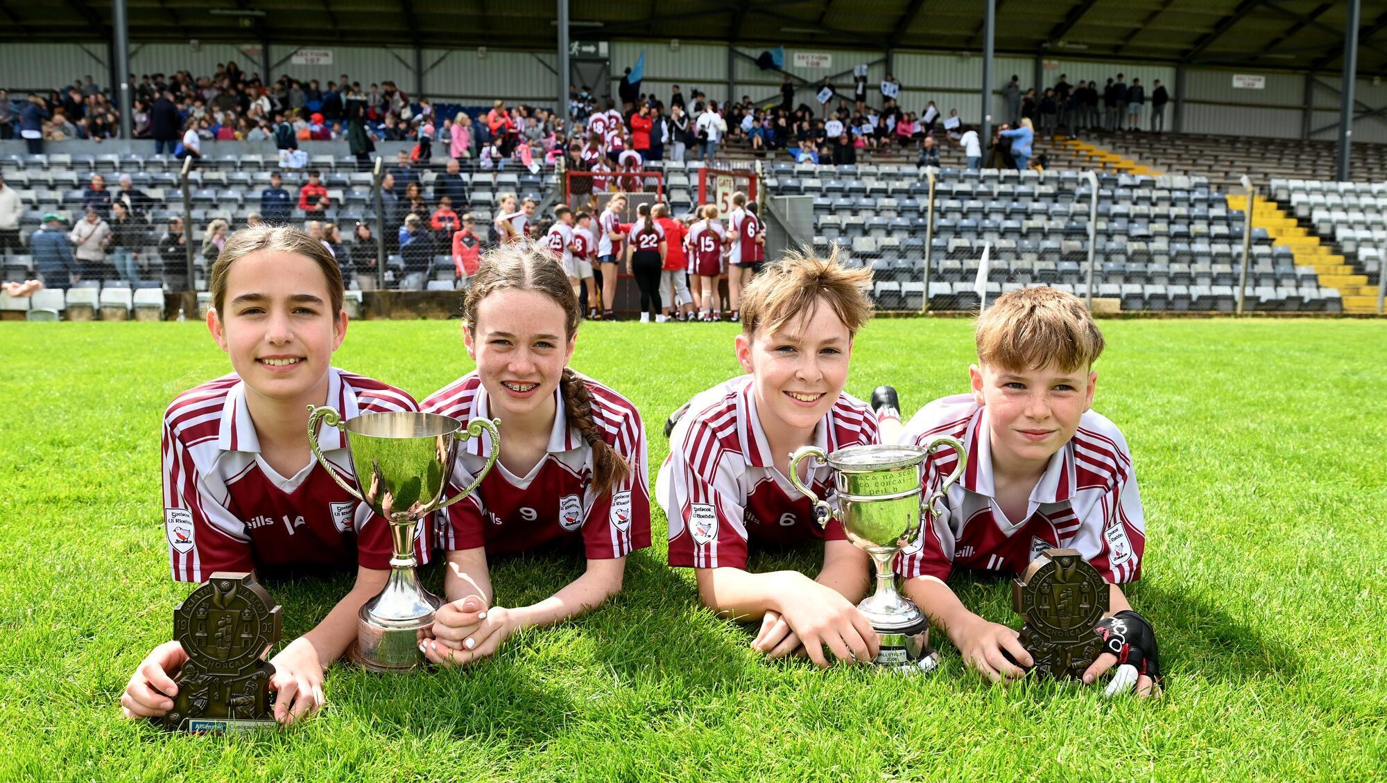 Vice captain Emma Nic Ghiolla Phádraig and captain Ciara Ní Chúipéir who won the DC1 final and captain Ronan O'Gormáin and vice captain Louis O'hÉalaithe, who were winners in the DH1 final.