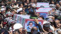 Iran buries late president at holy Shiite site after fatal helicopter crash