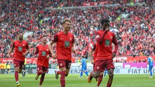 <p>ON A JOURNEY: Aaron Opoku of 1. FC Kaiserslautern celebrates after scoring his team's fifth goal during the Second Bundesliga match between 1. FC Kaiserslautern and Eintracht Braunschweig. Pic: Christian Kaspar-Bartke, Getty Images</p>