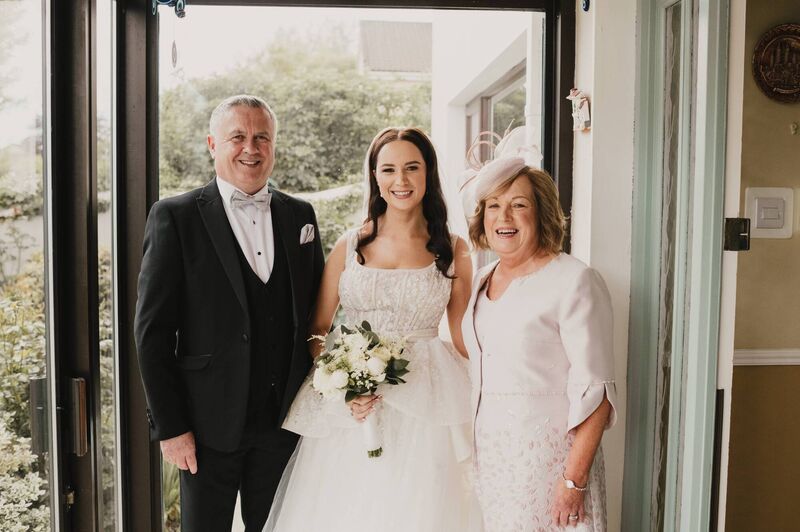 Nicola Holly with her parents Mary and Dannie Holly.