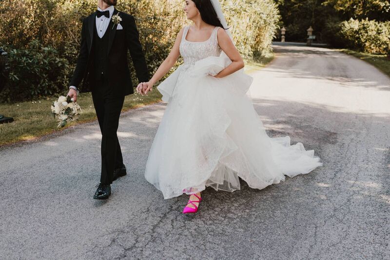 Bride Nicola wore pink Jimmy Choos. 