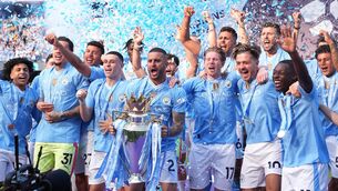 <p>MAKE MINE A DOUBLE: Kyle Walker lifted the Premier League trophy on Sunday (Martin Rickett/PA)</p>