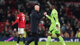 <p>Manchester United manager Erik ten Hag (left) and Andre Onana (Martin Rickett/PA)</p>