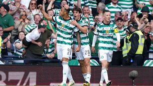 <p>GAME WINNER: Celtic's Adam Idah (left) celebrates scoring their side's first goal of the game during the Scottish Gas Scottish Cup final at Hampden Park, Glasgow. Pic: Andrew Milligan/PA Wire.</p>