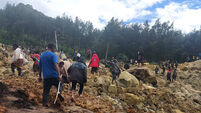 Survivors of massive Papua New Guinea landslide moved to safer ground