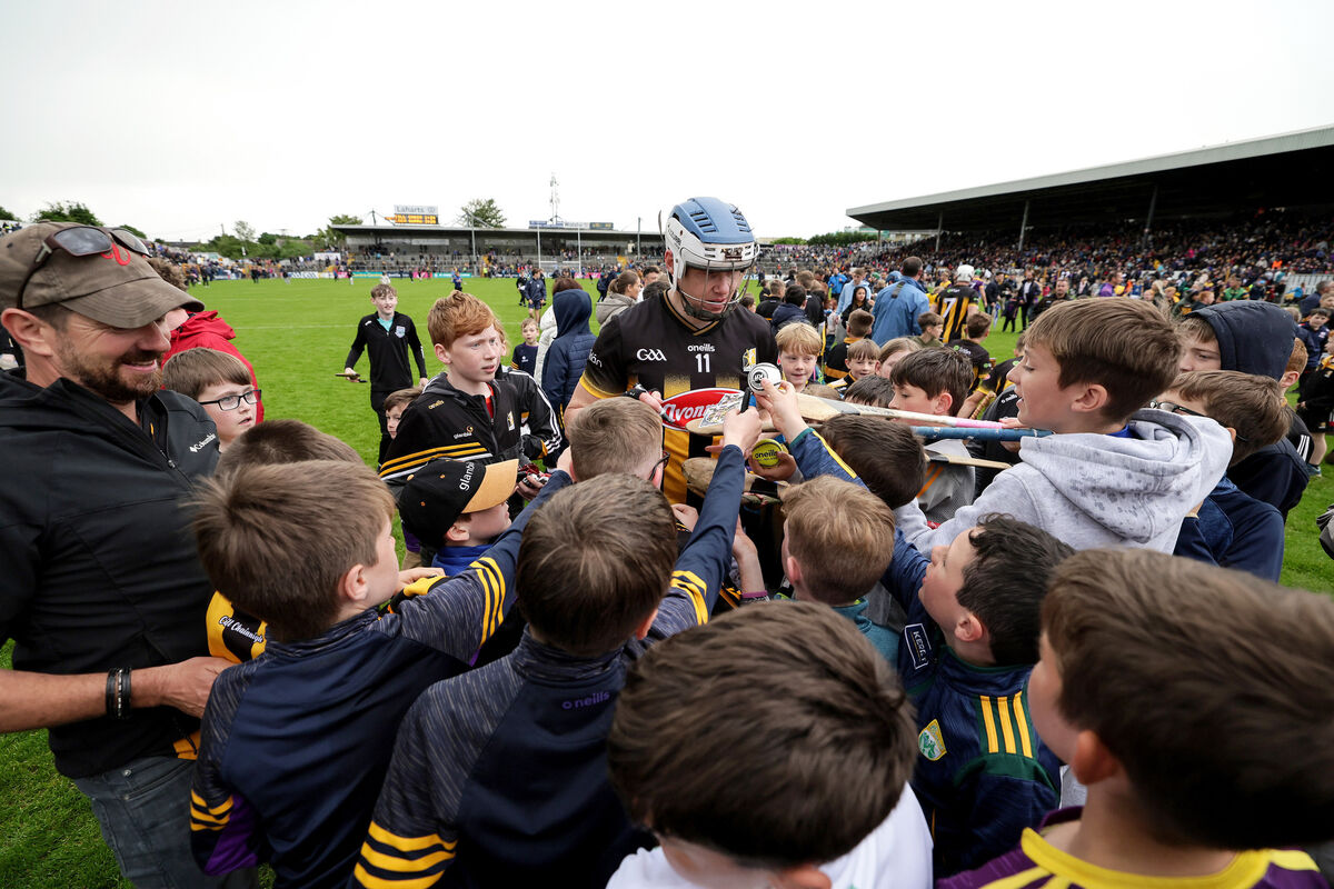 Kilkenny's TJ Reid signs autographs after the game. Pic Credit: Laszlo Geczo, Inpho..