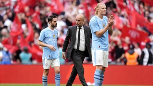 <p>Manchester City manager Pep Guardiola speaks to Manchester City's Bernardo Silva (left) after the Emirates FA Cup final at Wembley Stadium. Photo credit should read: Nick Potts/PA Wire.</p>