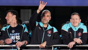 <p>LAST SEASON?: Manchester City manager Pep Guardiola holds up four fingers during a trophy parade in Manchester, after they won their fourth successive Premier League title and their sixth in seven years. Photo credit: Martin Rickett/PA Wire.</p>