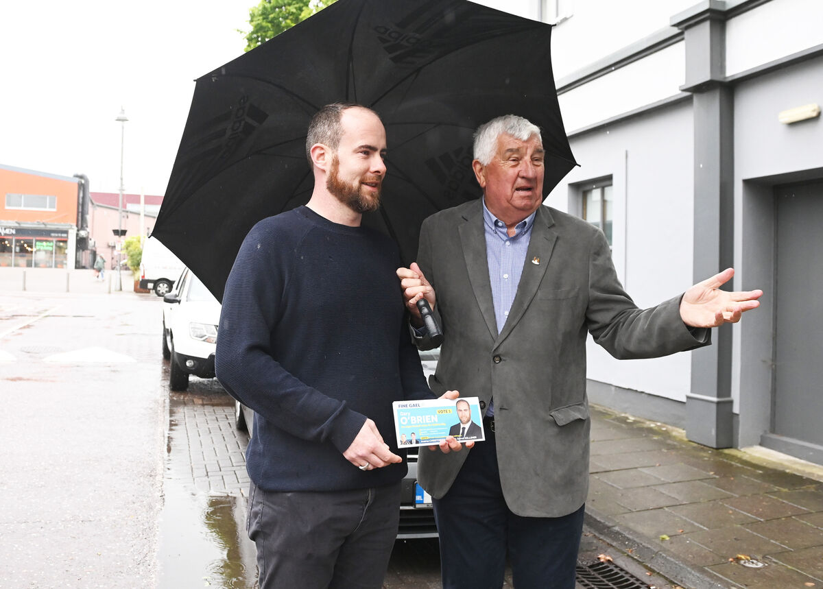 Fine Gael's Gary O'Brien, with retiring councillor Derry Canty canvassing in Ballincollig for the Cork City South West area. Picture: Eddie O'Hare