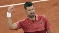 Novak Djokovic wins Roland Garros opener in straight sets