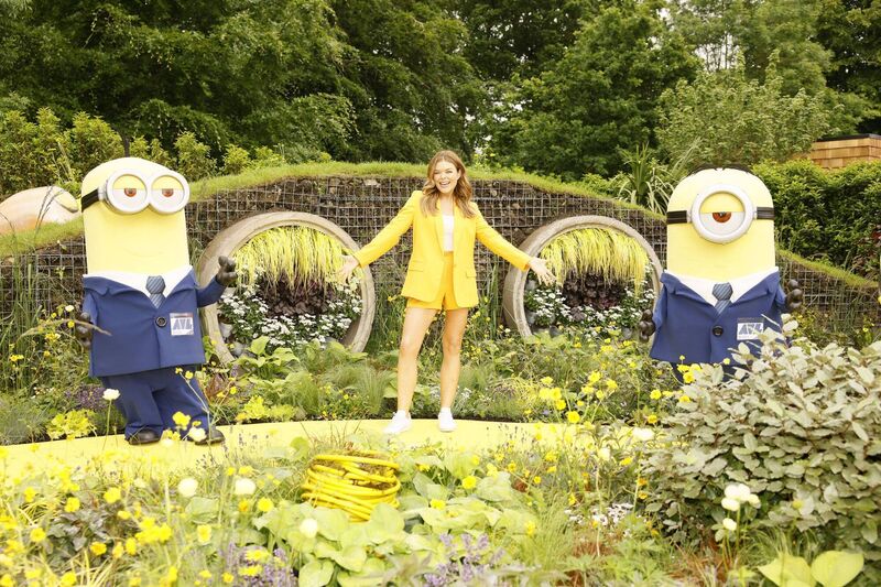 Doireann Garrihy with Minions Kevin &amp; Stuart at The Despicable Me 4 show garden. Picture: Kieran Harnett