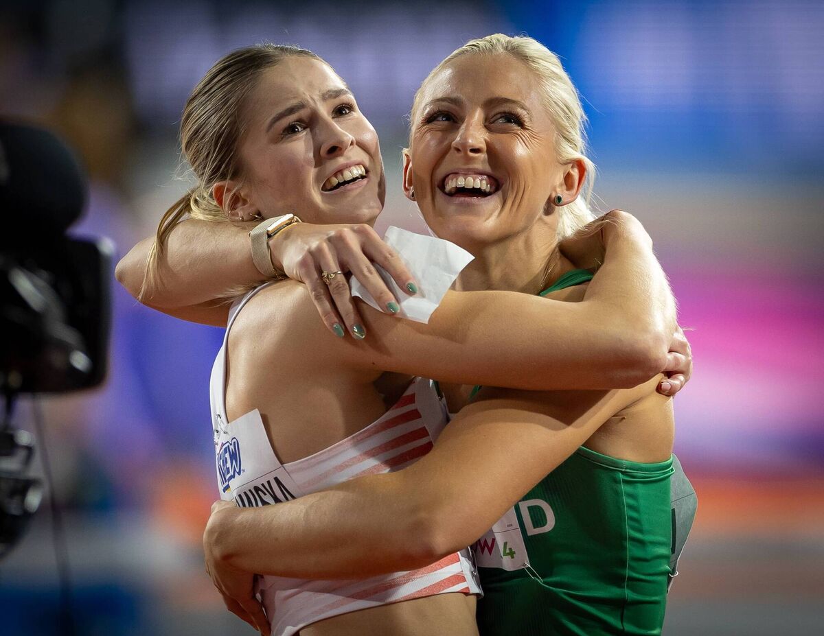 Ireland’s Sarah Lavin celebrates with Pia Skrzyszowska of Poland after the 60m hurdles final at the 2024 World Indoor Athletics Championships. Picture: ©INPHO/Morgan Treacy
