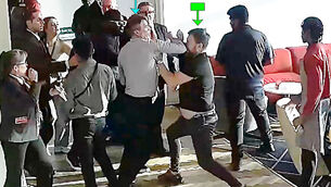 <p>A videograb showing the altercation between Roy Keane and Scott Law (Edward Fail Bradshaw &amp; Waterson/PA)</p>