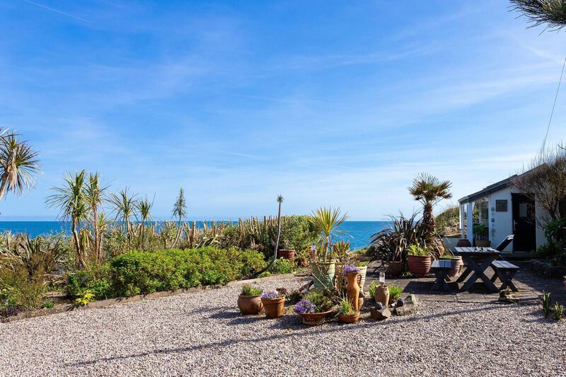 Second garden is by the water and slipway's edge, with studio Second garden is by the water and slipway's edge, with studio