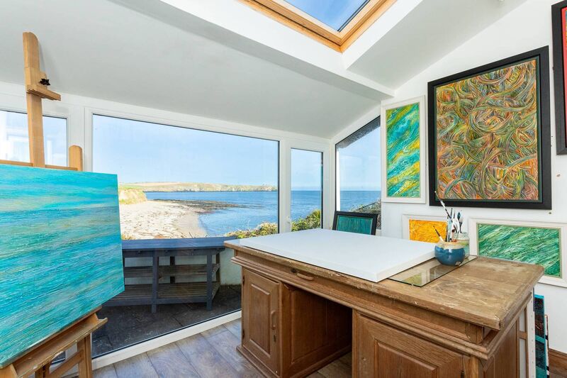 Owner's art in her studio, with a view to Poer Head Owner's art in her studio, with a view to Poer Head
